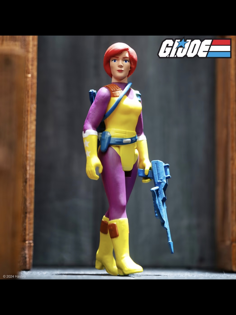 Hasbro Pink & Yellow Female G.I. Joe Action Figure with Blue Rifle